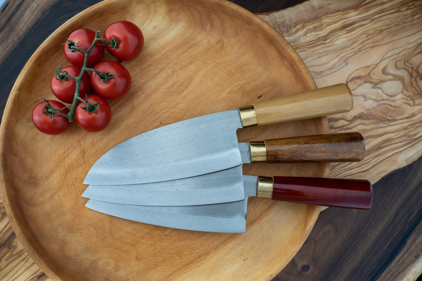 Chikara japanese carbon steel kitchen knife in red, brown and light