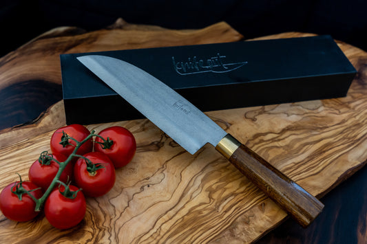 The Sabaku japanese carbon steel knife in brown with its packaging